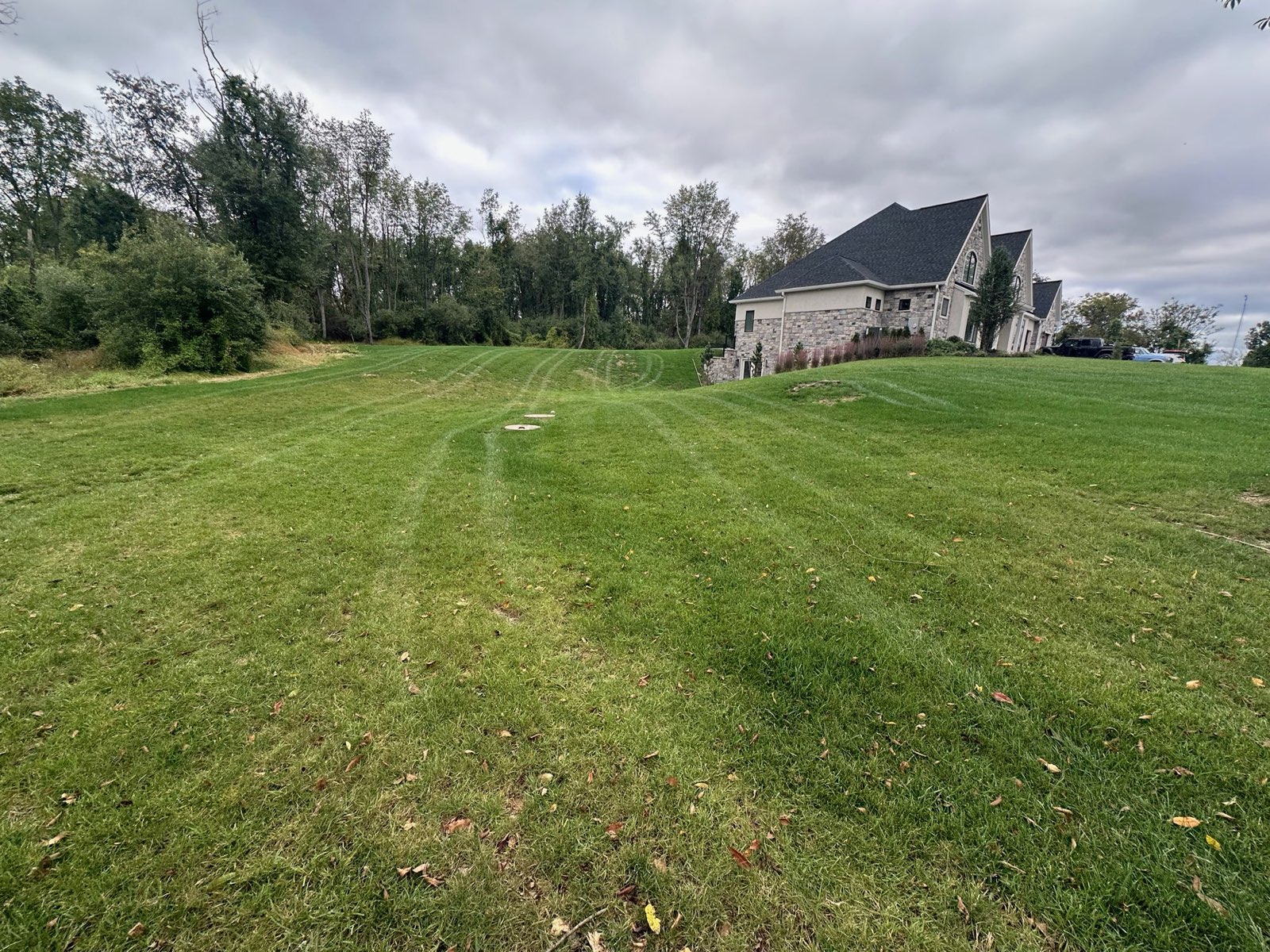 Thick, evenly striped turf on a Central PA property
