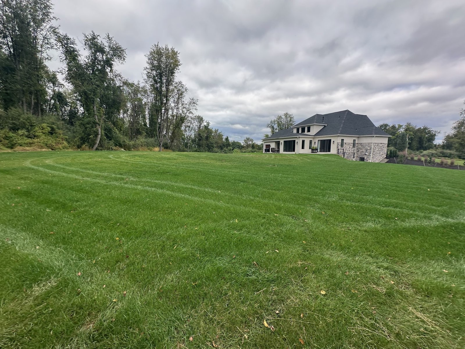 Thick, evenly striped turf on a Central PA property